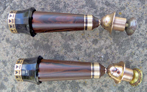 ITEM #5768-9: SET OF WAHL EVERSHARP DORIC ROSEWOOD DESK BASE SOCKETS. These are not hard rubber; they appear to be real rosewood. The diameters of the pens that would fit in the sockets is 0.434" and the diameters of the cylinders on the sockets that go into the base is also 0.434". The sockets would be secured in the base with included screws and washers.